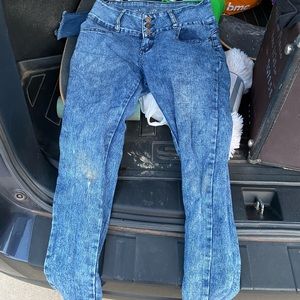 High waisted dark stained jeans